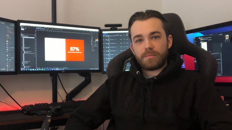 Motion Graphics Designer Oscar Gilbert at his workstation